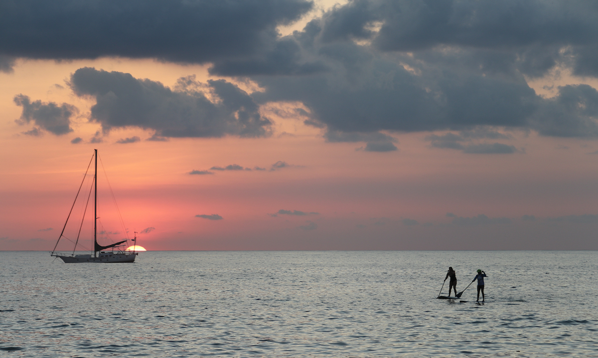 paddle boarding costa rica sunset