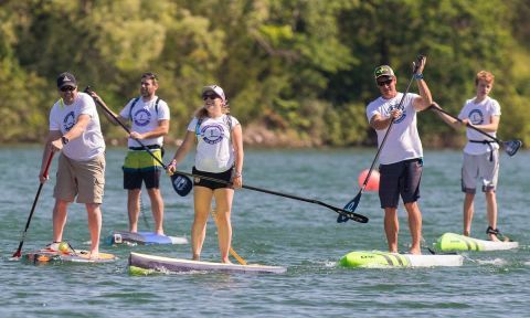 Madeline LeBlanc (center) paddling for Cancer at 2017's On Board. | Photo via Madeline LeBlanc