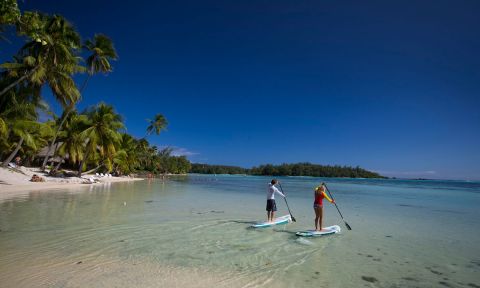 Sean Poynter and Izzi Gomez of team Starboard in Tahiti. | Photo: Ben Thouard