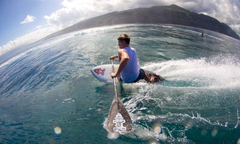 Learn how to catch a wave on your SUP with help from Sean Poynter! | Photo: Ben Thouard