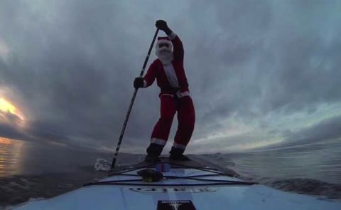 Santa Visits Seattle on a Standup Paddle Board