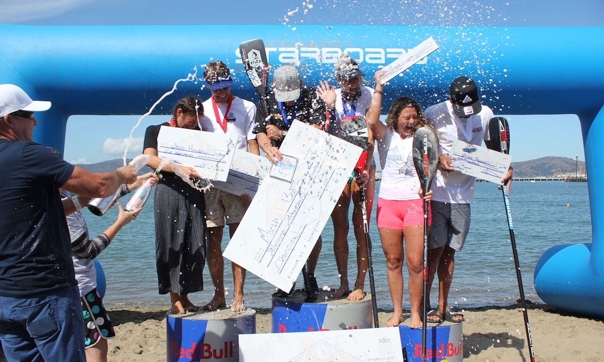 Champagne showers after the 8th Annual Battle of the Bay. | Photo courtesy: OnItPro