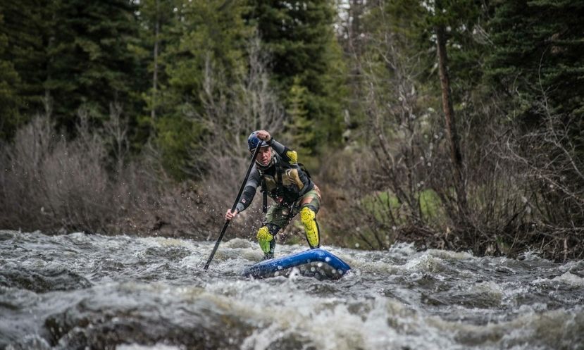 Andrew Smith paddling the Hala Straight Up down the Elk River outside Steamboat Springs, Colorado.