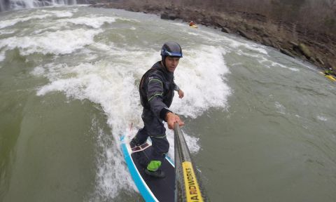 River expert Mike Tavares river surfing. | Photo: Mike Tavares