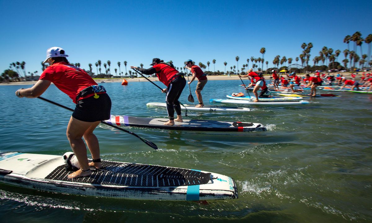 Panda Paddle event participants in Bonita Cove, California, United States. | © Day's Edge Productions