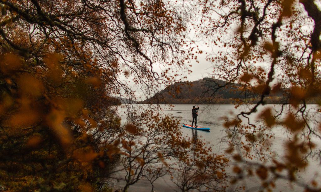 Paddling through the Autumn colours of Loch Ruthven, Scotland. | Photo: Johny Cook