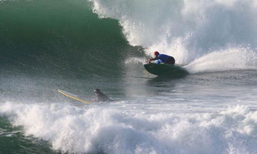 Sup Surfing at Steamer Lane, one of the world&#039;s most iconic waves in Santa Cruz, California.