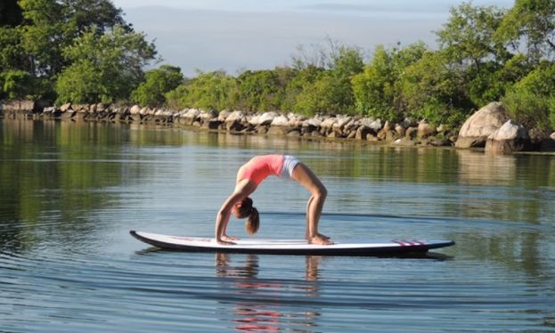 5 Reasons To Take Your Yoga Off The Mat And Onto A Paddleboard