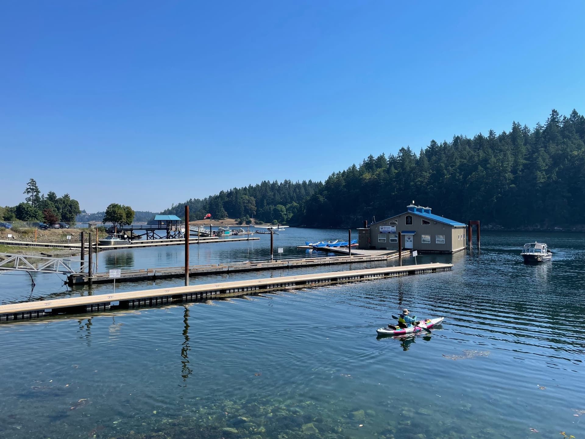 A pier reaching into calm water at Departure Bay in Nanaimo on Vancouver Island