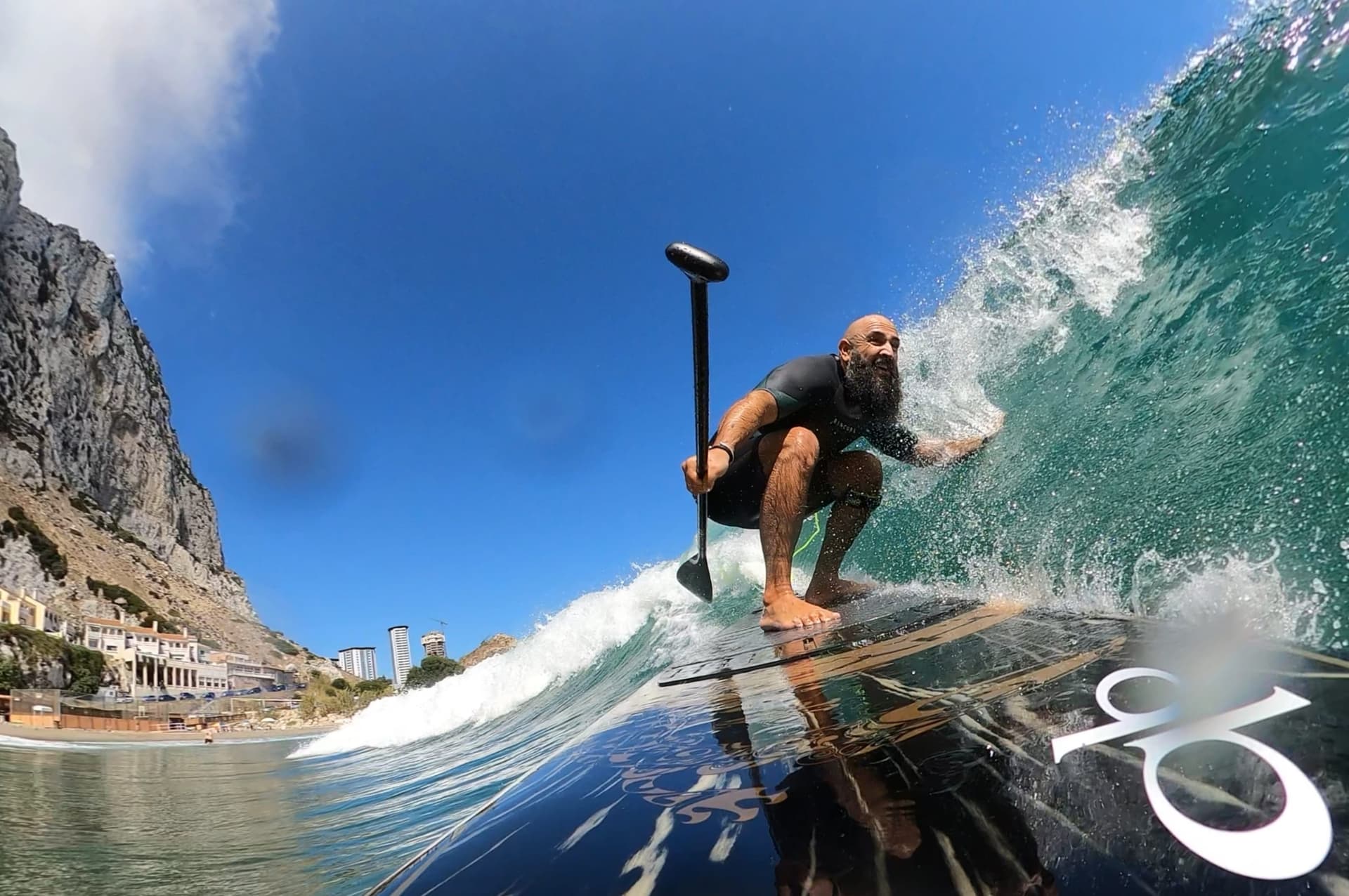 Trailing my hand on a glassy wave as I sup surf the Hypr Kaimana 10,6 on a perfect day at Catalan Bay village. When the planets align and the conditions are good at this quaint little Mediterranean village the lefts come pumping in constantly... | Photo courtesy: Alex Trinidad, Supconnect Photo Contest 2023