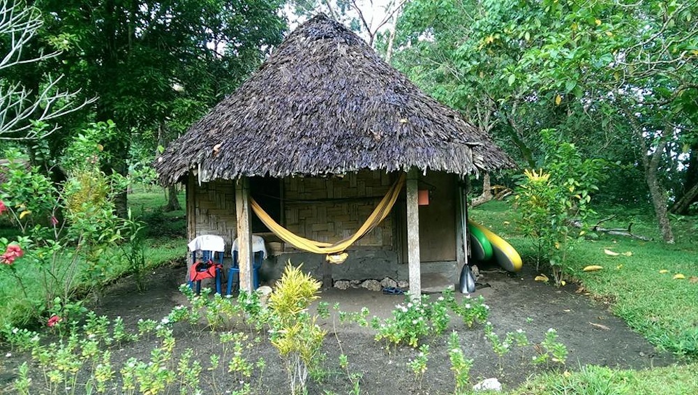 basic thatched huts for travellers to matantas villlage espiritu santo vanuatu