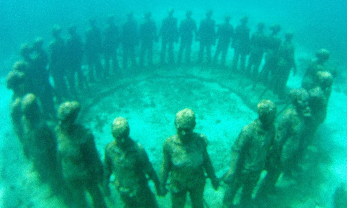 paddle boarding grenada underwater sculptures tez plavenieks