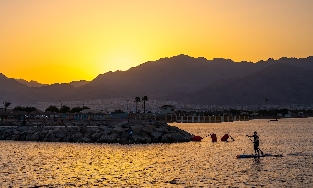 paddleboarding israel red sea sunset