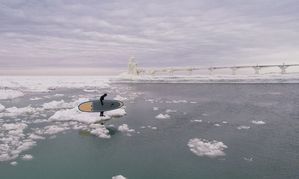 paddle boarding among icebergs lake michigan 8