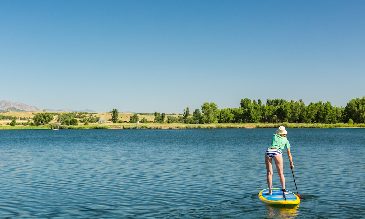 paddle boarding with a cold