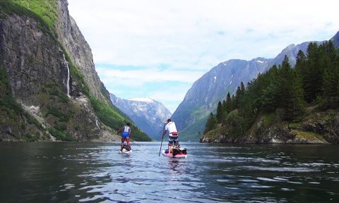 Titus and Sean paddle along the beautiful Sognefjord.