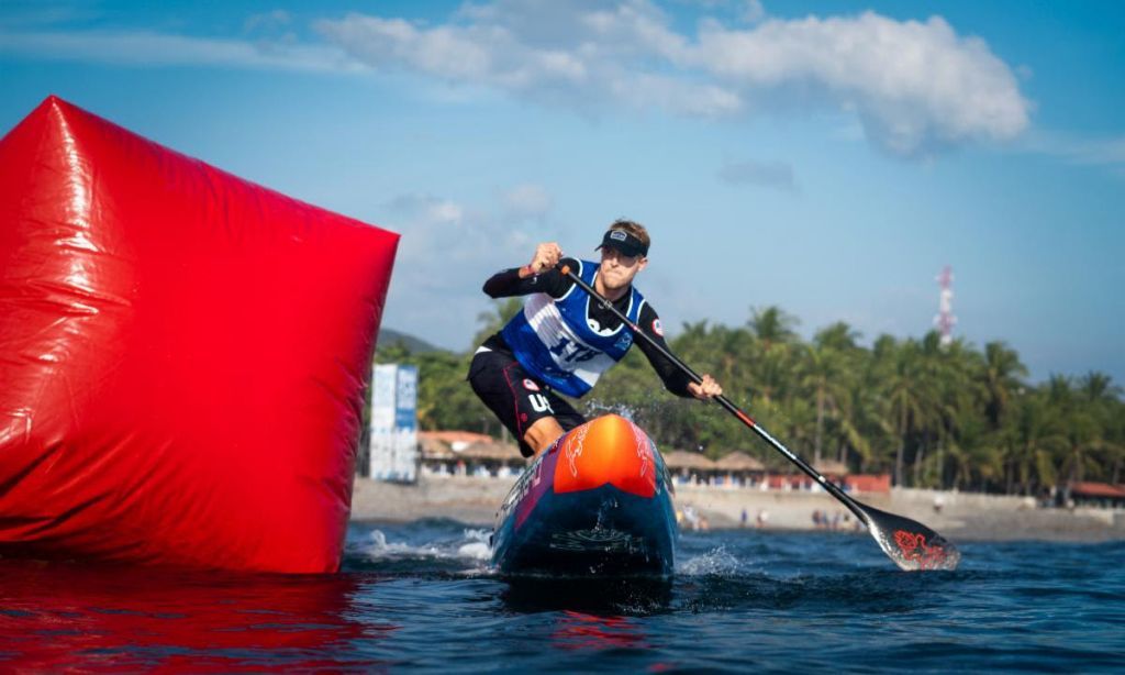 ISA and Pan Am SUP Gold Medalist Connor Baxter (USA) rounds a buoy at the 2019 ISA World SUP and Paddleboard Championship in El Salvador. | Photo: ISA / Sean Evans