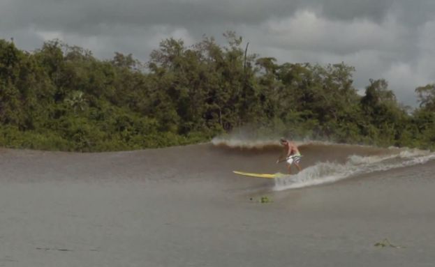 Stand Up Paddle Surfing On Amazon River Tidal Bore