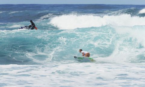 Fiona with a classic bottom turn gaining momentum for a big forehand hack. | Photo: Brian Bielman