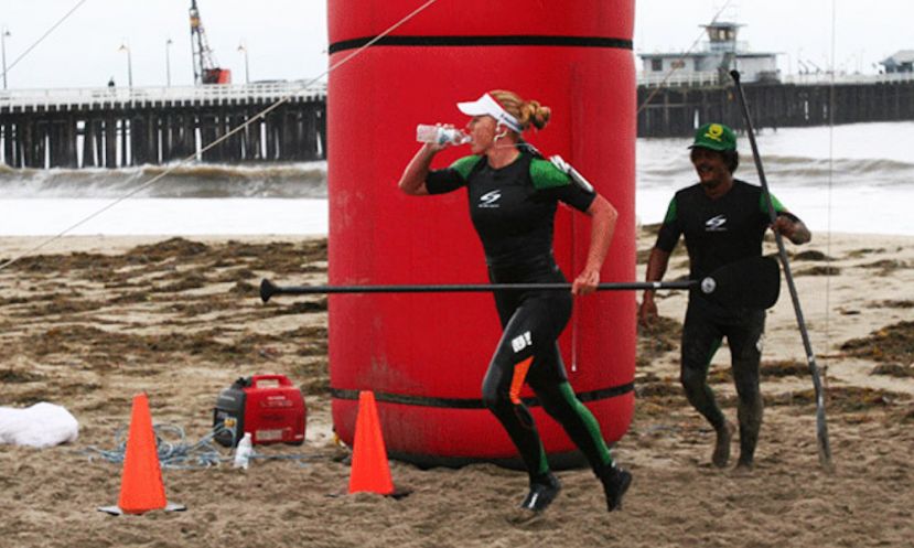 Candice Appleby going for the last beach run with Anthony Vela cheering her on in Santa Cruz, California.