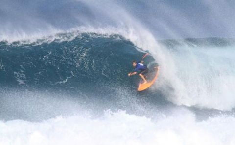 Lining up for a coverup at the Standup Paddle Surfing World Tour in Sunset Beach 2012.