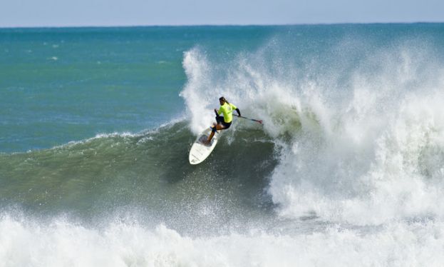 Overall leader Caio Vaz (BRA) during the SUP Surfing competition in Fiordland. | Image courtesy of Cory Scott