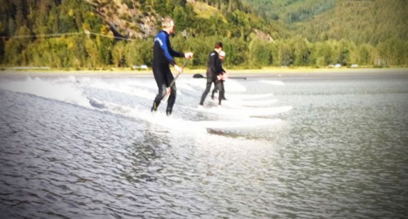 SUP Surfers Ride Tidal Bore