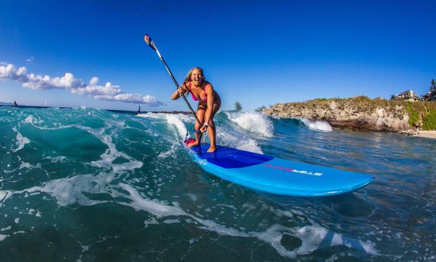 World Champion and Starboard SUP athlete Izzi Gomez knows how to have fun in the water. | Photo: Starboard / Georgia Schofield