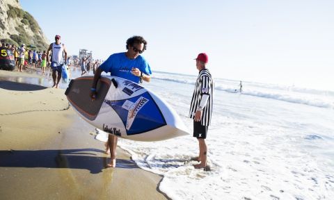 Sup Think Tank co-founder, world renowned paddle board designer and board caddy to the elite, Brian Szymanski, putting the LiftSUP handle to good use at the 2014 Battle of the Paddle.