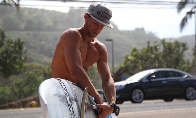 Josh Riccio waxes up as he prepares for competition at the #SunsetBeachPro. | Photo Courtesy: Riley Mundia