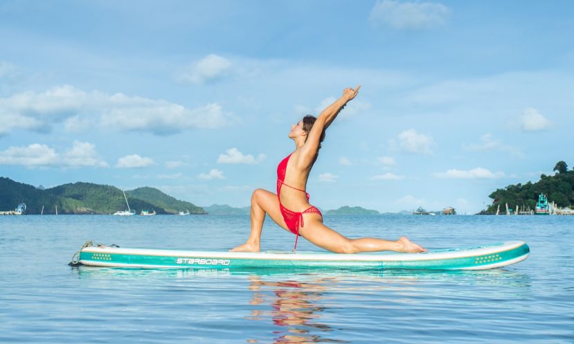 Dashama Gordon, SUP Yoga professional. 