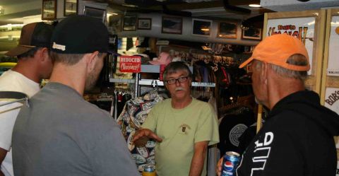 Bob Long (center) talks stand up paddle boards with Boardworks Surf chief operating officer, Bob Rief (right).