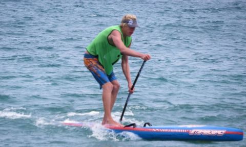 Connor Baxter, keeping warm in the chilly conditions of the St'Ives Celtic Cup. | Photo: Starboard UK