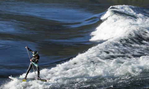 Britany Parker is among the elite river surfing athletes. | Photo: Heather Jackson