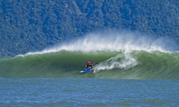 Defending champion Zane Schweitzer en route to winning the SUP Surfing event during The Ultimate Waterman. | Image courtesy of Cory Scott. 