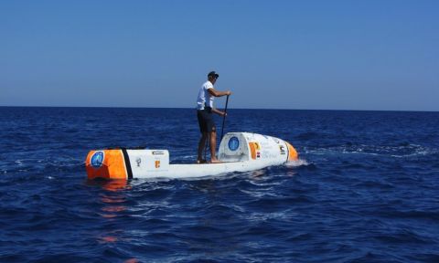 Nicolas Jarossay tests out his custom SUP made for his Transatlantic excursion.