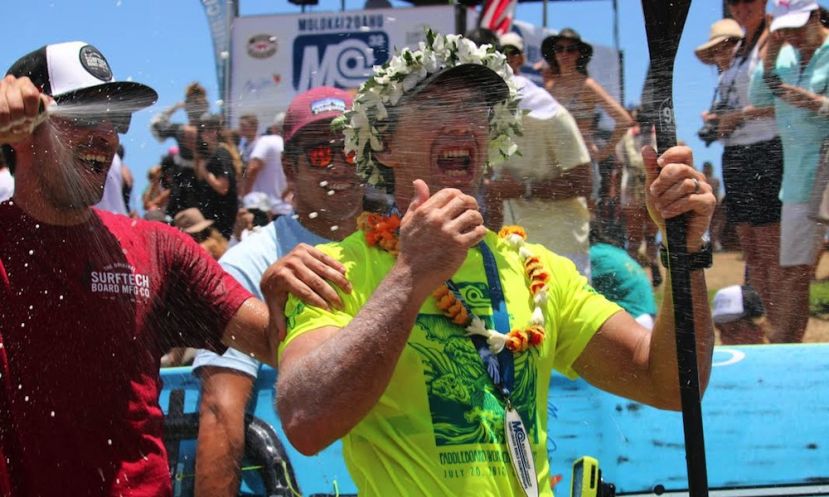 Travis Grant receiving a well-deserved champagne shower after winning the M2O. | Photo Courtesy: NSP