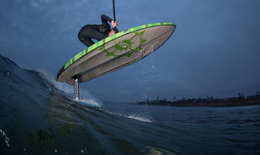 Casey Brown SUP foiling into the night in Carlsbad, California. | Photo: Dominique Labrecque