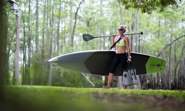 Magdalena Cooper with BOTE's new Travelink board and Travelink carrying system. | Photo Courtesy: BOTE Boards