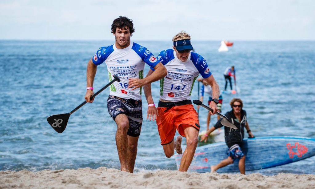 Mo Freitas (left) and Connor Baxter (right) battle at the finish line at ISA World SUP Championships in 2017. | Photo Courtesy: ISA