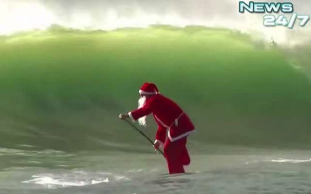 Santa Spotted SUP Surfing!