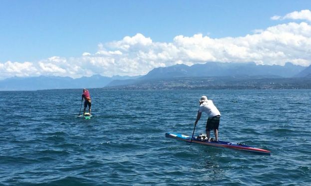 Steeve Fleury and Robert Etienne paddle on lake Léman.