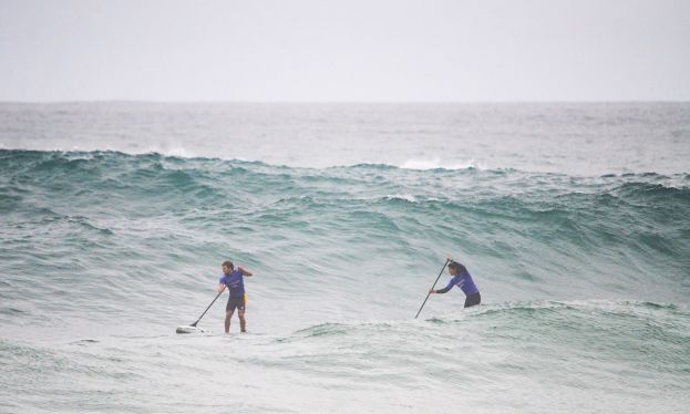 SUP racers navigating the swell. | Photo: Latinwave