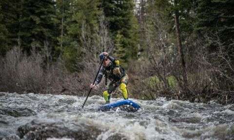 Andrew Smith paddling the Hala Straight Up down the Elk River outside Steamboat Springs, Colorado.