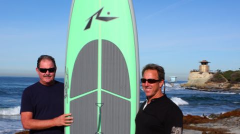 Rusty Preisendorfer and Mike Fox, owner of Boardworks, standing at a well-know sup surf break in San Diego County. Do you know what's called?