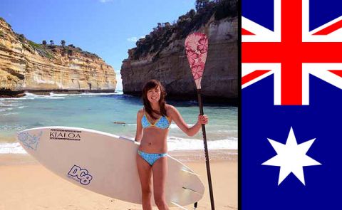 Kristi Page posing with a bikini line of a sponsors(left) and the trademark colors of the Australian flag. Photo: Phillip Page