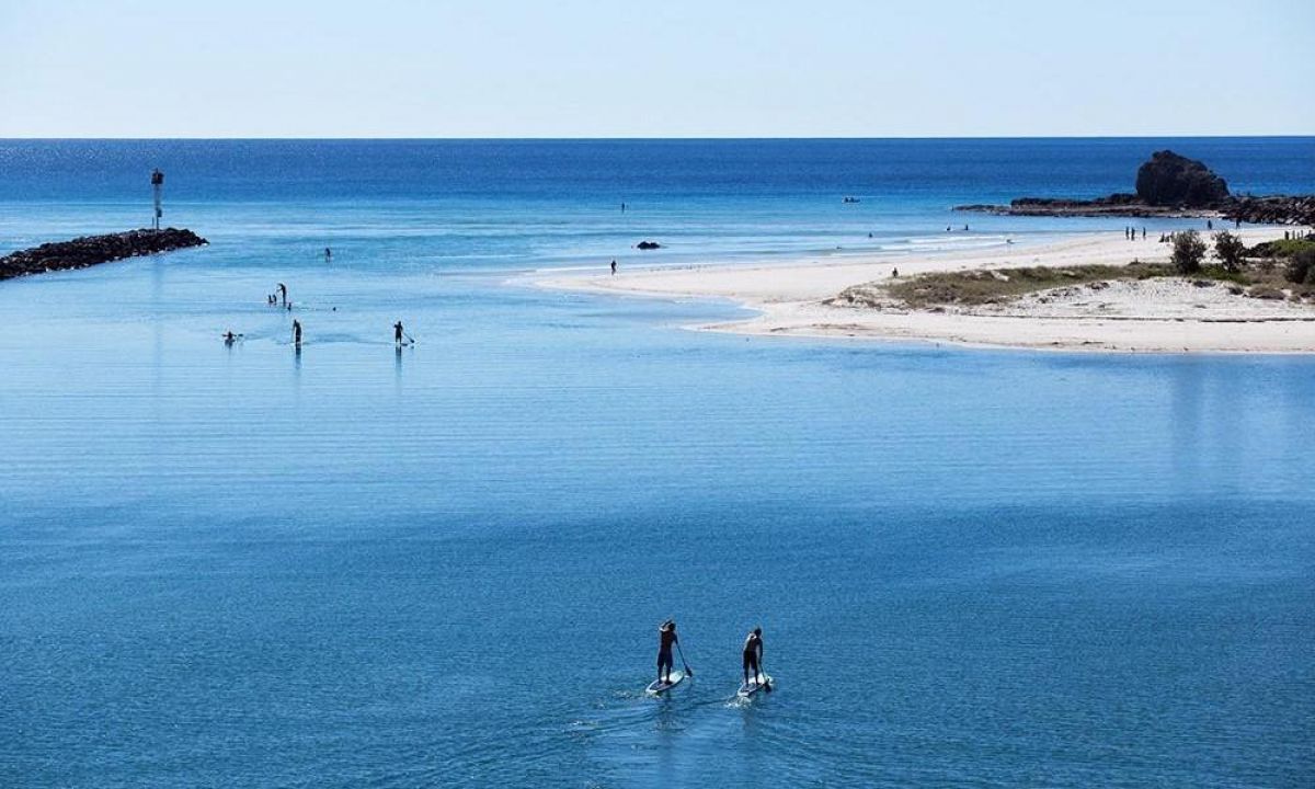 Paddle boarding Currumbin Creek in Queensland, Australia. | Photo Courtesy: Nick King