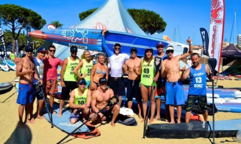 Team Starboard and friends all smiles before the big race. | Photo Via: Karen Baxter